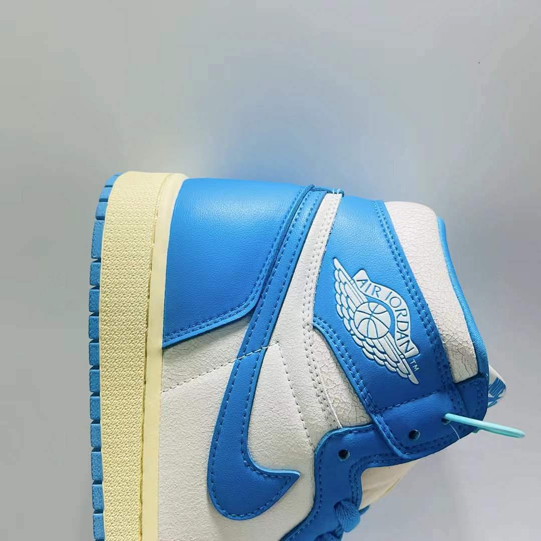 Air Jordan 1 Retro High OG University Blue UNC White Vintage Aged Sail Midsole Sneakers 555088-134