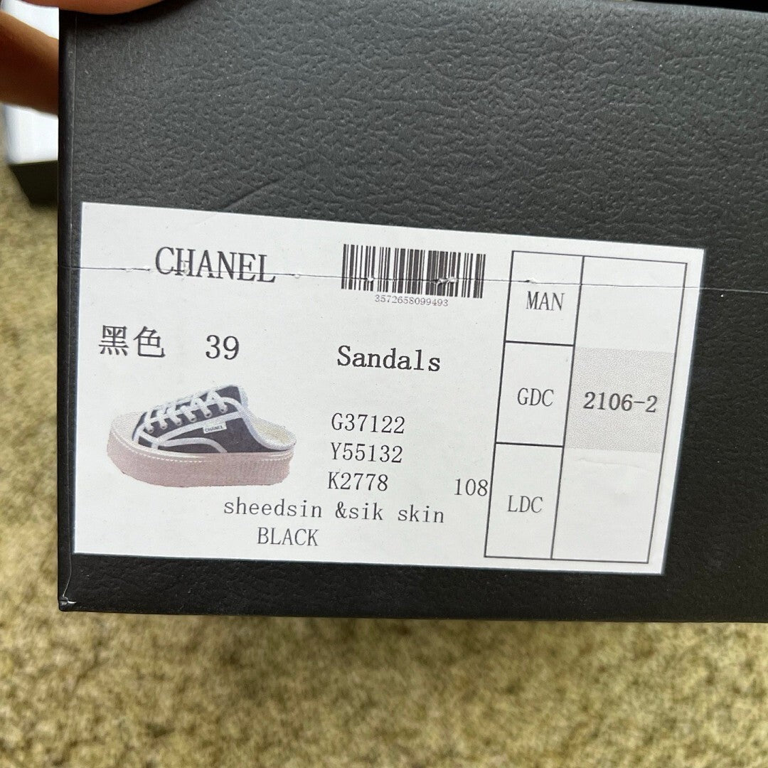 CHANEL Mules in Canvas, White & Black G43690 X56531 K4004