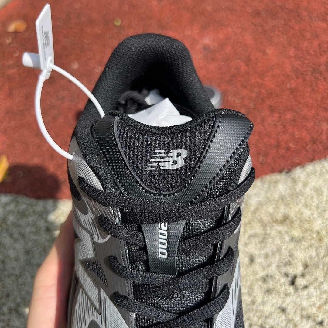 New Balance 1906R Black Grey with Translucent Segmented Sole