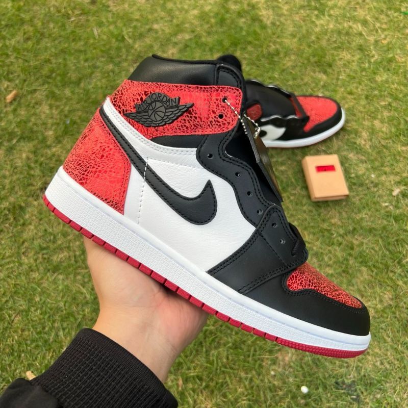 Air Jordan 1 Retro High OG Black Toe Origin Story Red