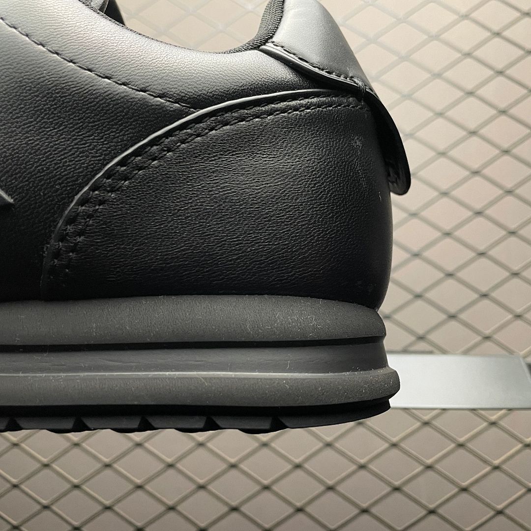 Louis Vuitton LV Runner Monogram Embossed Black Leather Low-Top Sneakers