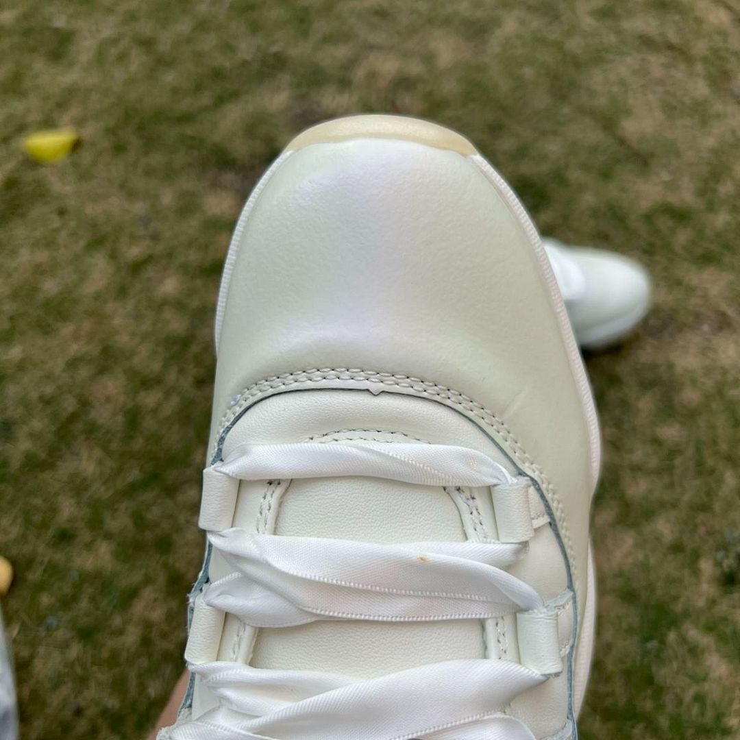 Air Jordan 11 Retro White Iridescent Metallic Silver Vast Grey GS Sneakers 378038-100