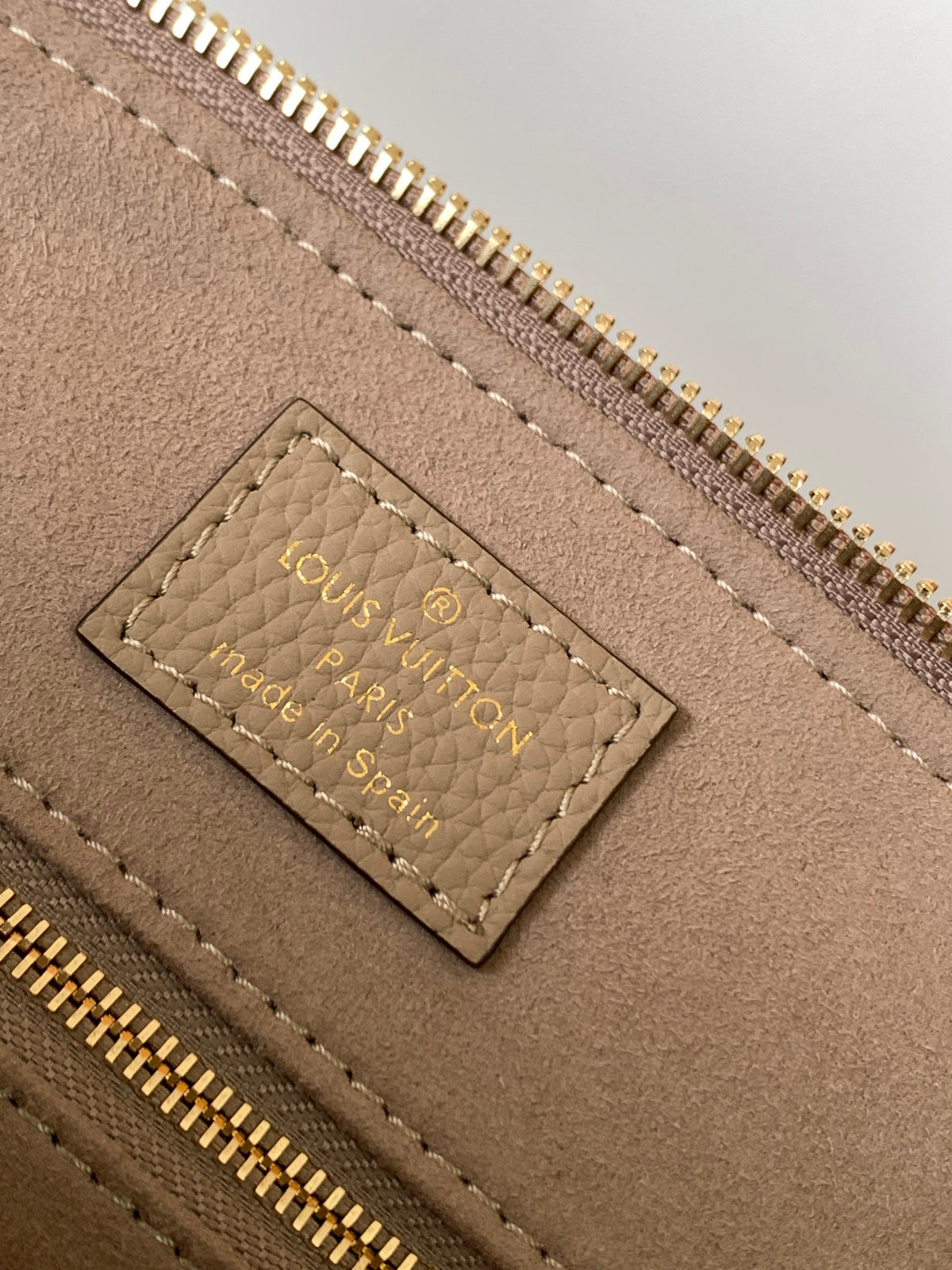 Louis Vuitton Montaigne BB Monogram Empreinte Leather Handbag - Tourterelle