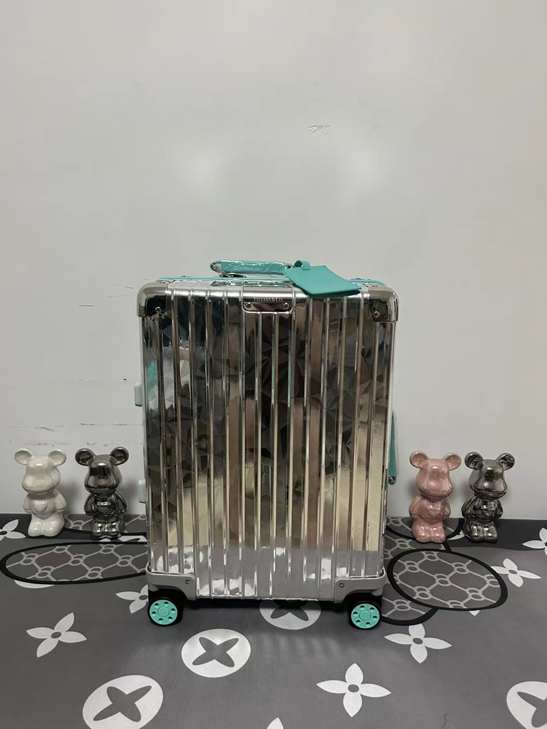 Metallic Silver Ribbed Hard Shell Carry-On Suitcase with Teal Accents