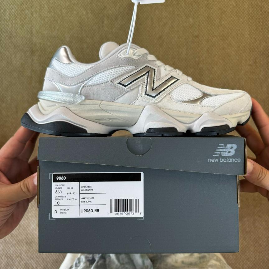 New Balance 9060 sneaker in a White and Metallic Silver