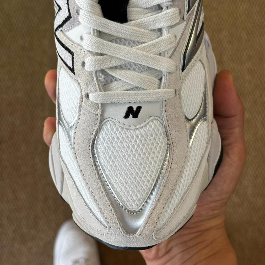 New Balance 9060 sneaker in a White and Metallic Silver