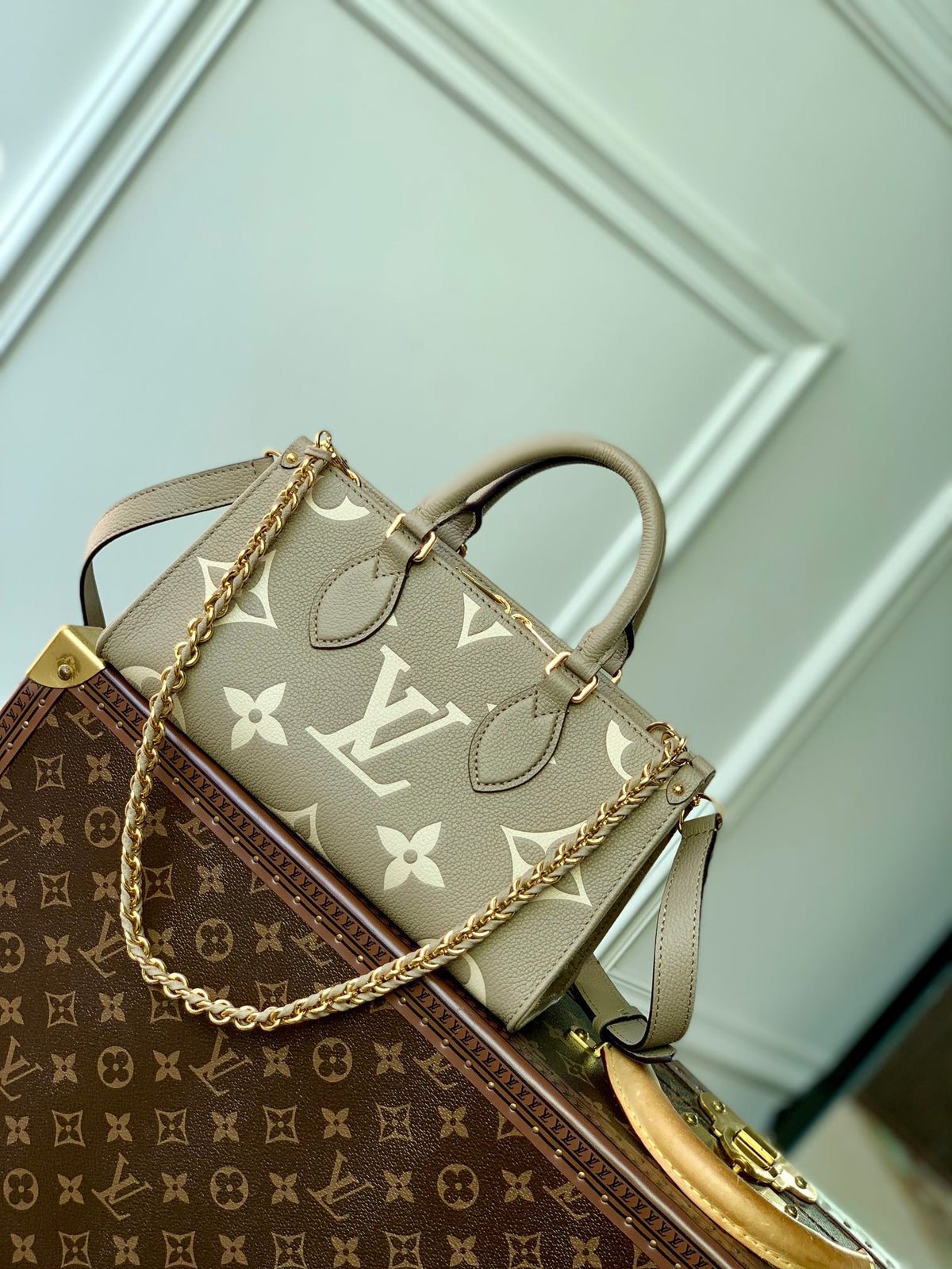 Louis Vuitton OnTheGo East West Bicolor Monogram Empreinte Leather Handbag - Tourterelle / Crème