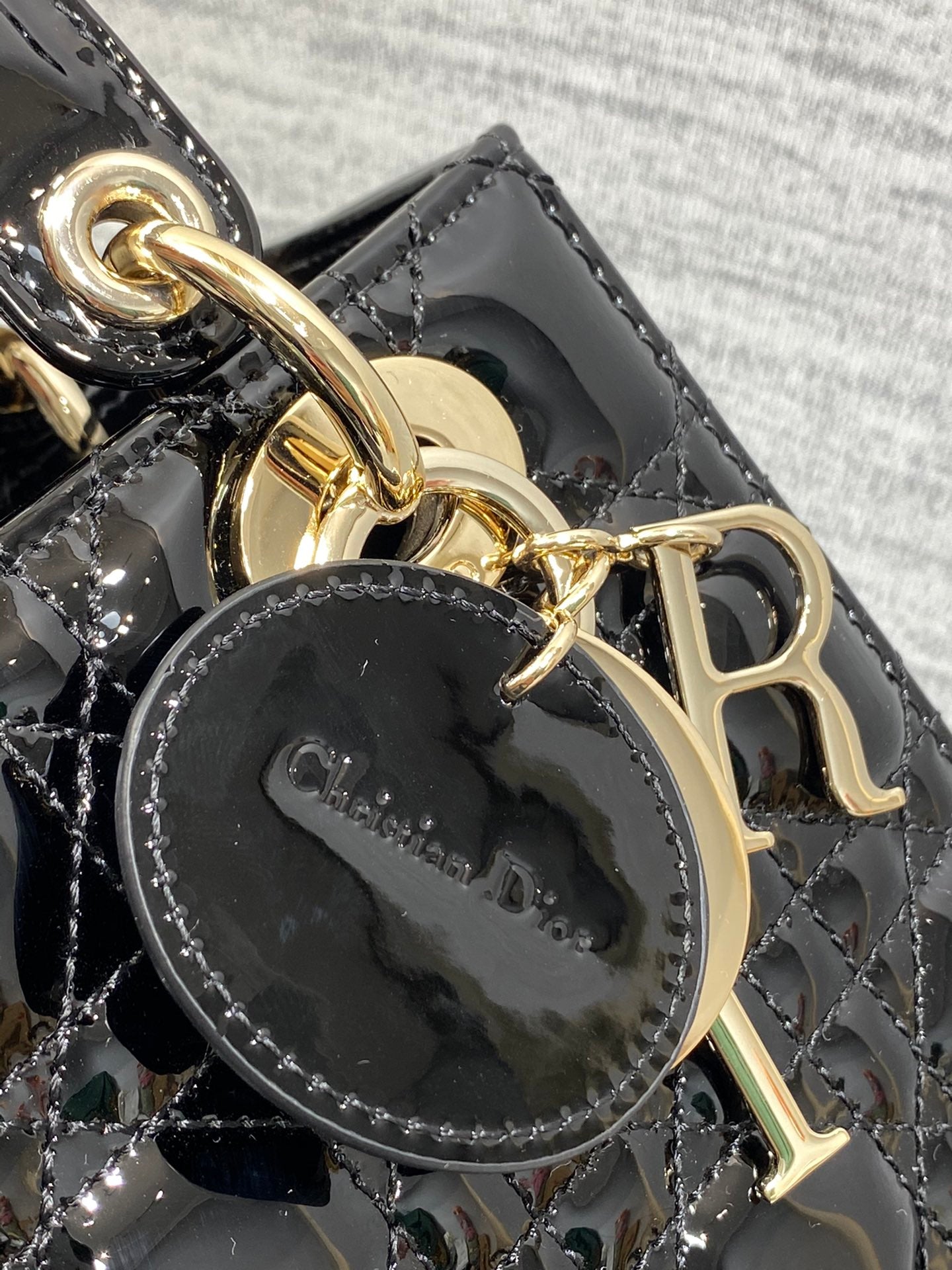 Dior Elegant Black Patent Quilted Mini Tote Bag with Gold Tone Hardware