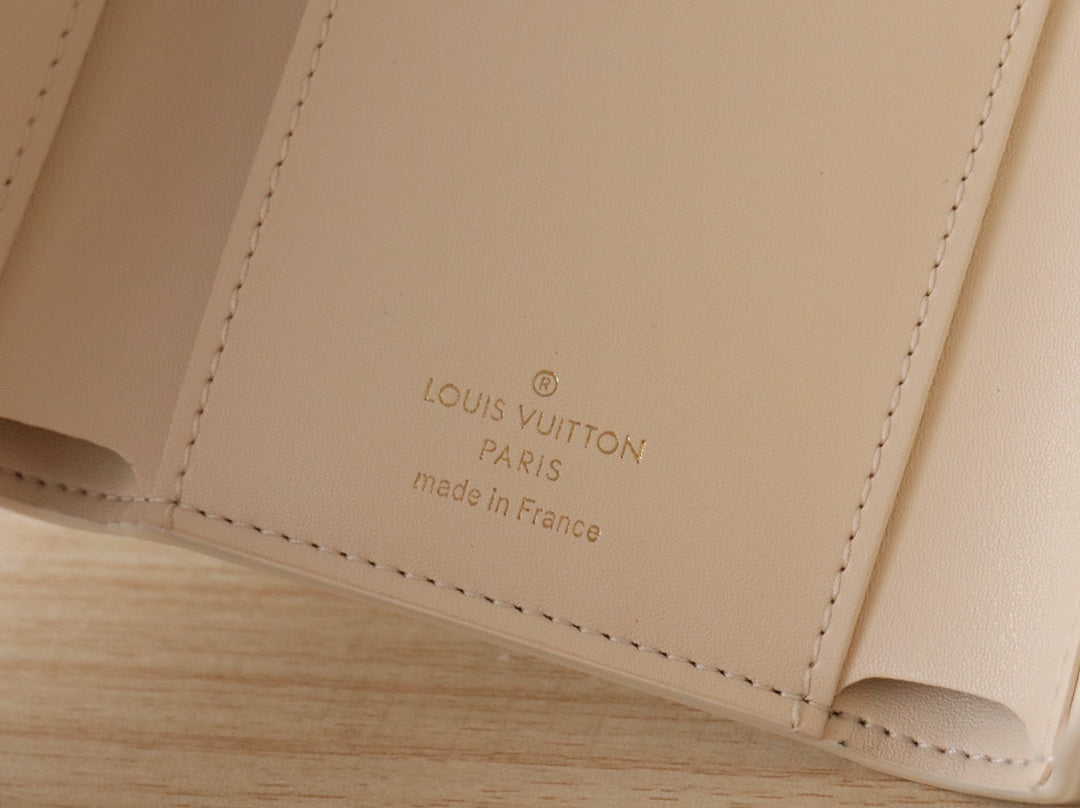 Louis Vuitton Luxury Cream Textured Leather Compact Wallet with Gold Clasp