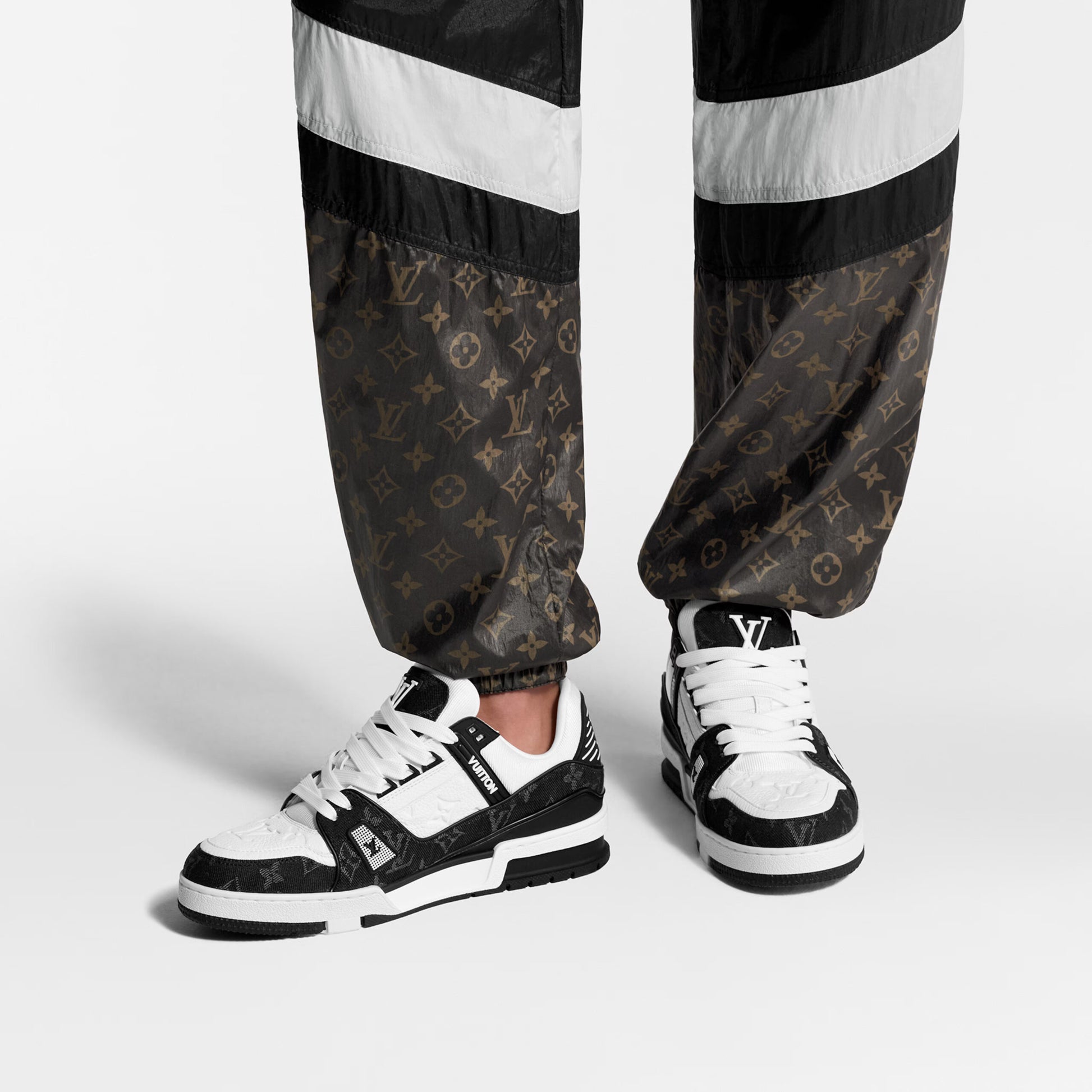 Louis Vuitton LV Trainer Maxi sneaker in black and white monogram denim and leather.